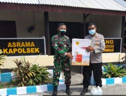 Kapolsek Mayang Sumbang Satu Unit Alat Semprot dan Cairan Disinfektan kepada Koramil 0824 Mayang