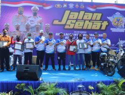 Sambut HUT Lantas ke-67, Polres Gresik Gelar Jalan Sehat dan Bagikan Doorprize