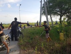 PSHT Rayon Bandungrejo Bersihkan Semak Belukar PUK Ngasem