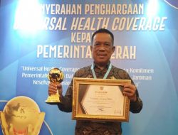 Pemkab Lampung Utara Menerima Penghargaan UHC Program JKN-KIS