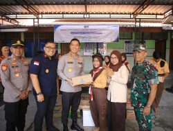 Kapolres Madiun Bersama Imigrasi Salurkan Bansos dan Makan Bergizi Gratis di SLBN Banjarsari Wetan